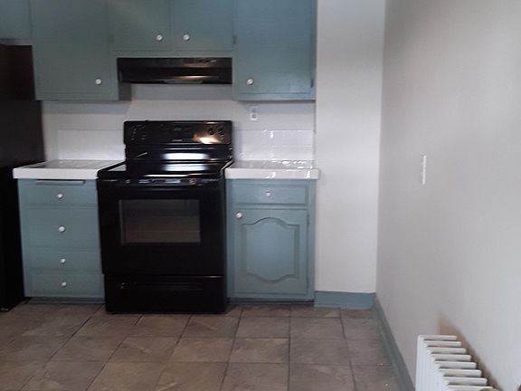 Kitchen entry way from balcony door lake side.