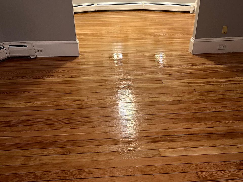 Freshly painted living room/dining room with refinished floors