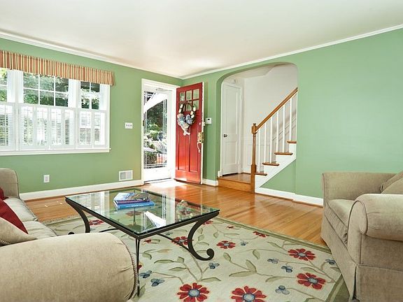 Bright, clean and crisp living room - the extra windows make all the difference