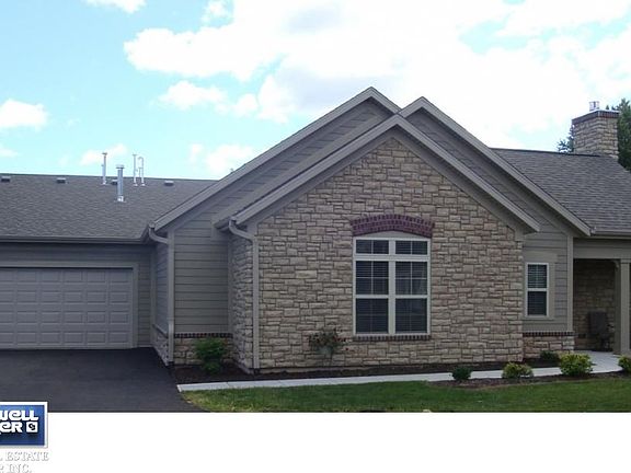 Front of Condo with Garage