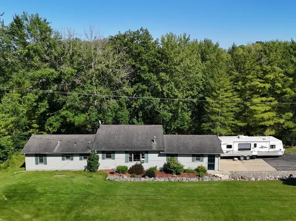 89 River Dr, Merritt, MI 49667