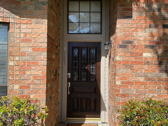 Front Door Newly Painted & New Door Hardware.