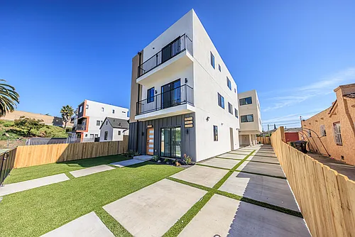 Luxury Never Before Lived in Townhomes! Photo 1