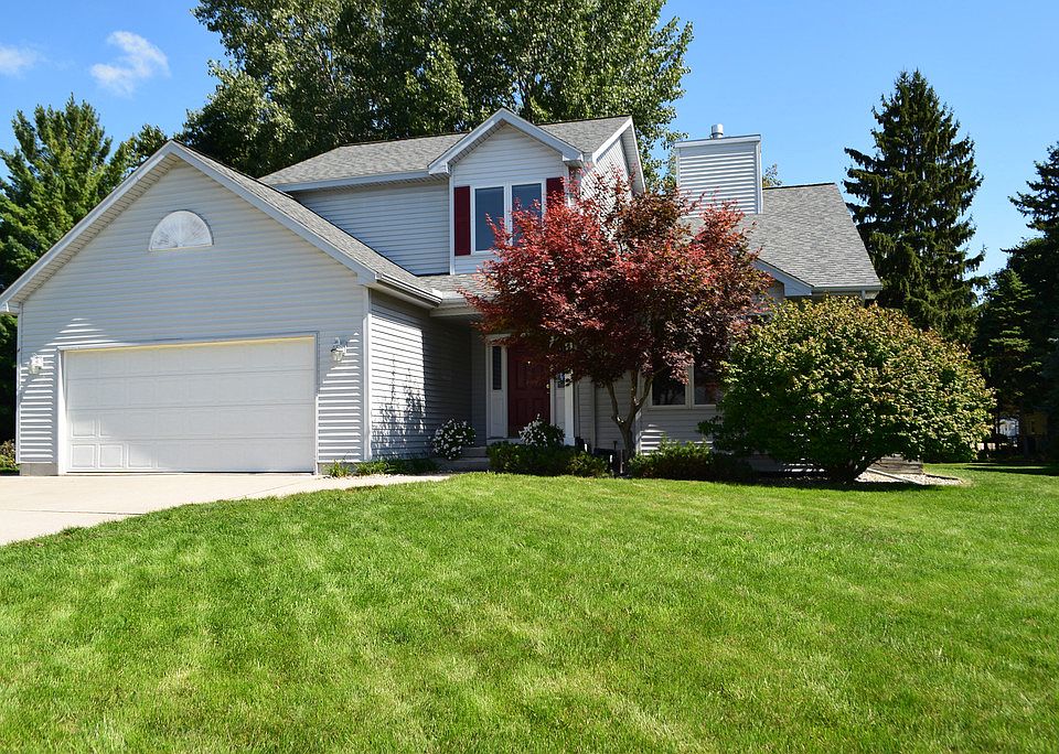 Welcome Home.  This wonderful 3-bedroom home features 2-full and 2-half baths, a nicely finished basement, and newer surfaces throughout including all hard-surface floors.  The master suite has a full bath with jetted tub and a walk-in closet.  A two-sided gas fireplace ties the living room and family room together.  The recreation room in the basement includes an egress window for natural light plus a half bath.  The main floor laundry is a nice touch, too.