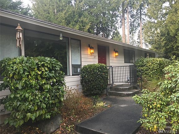 Dining area has sliding door access to sunroom.