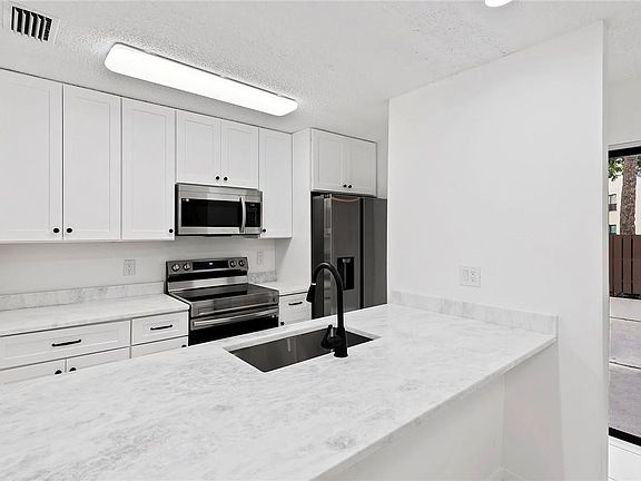 2nd image of 3917 Cocoplum Circle