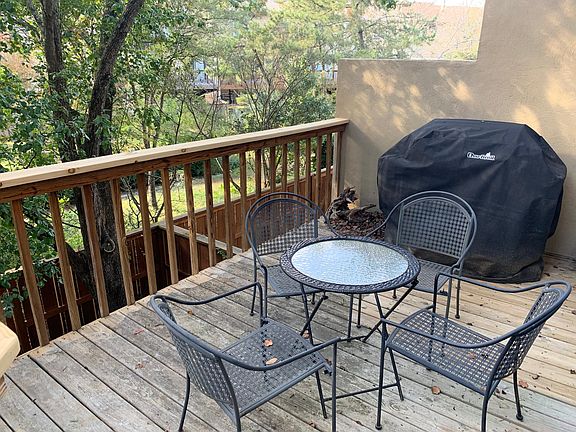 Back deck, patio furniture and grill included.