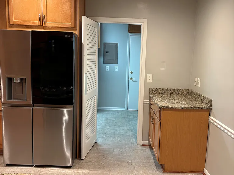 Kitchen looking at laundry room