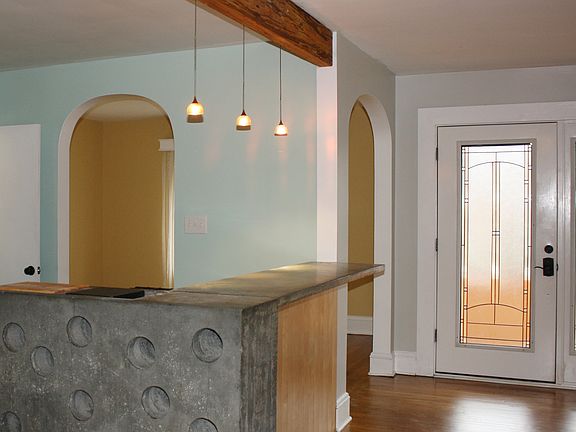 Kitchen bar and front entrance