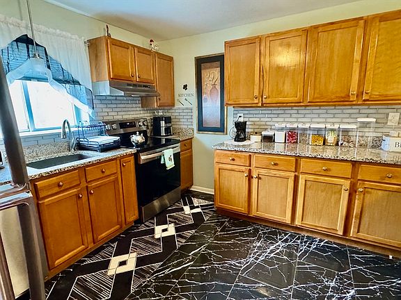 2nd image of 5455 N Main St APT 9F