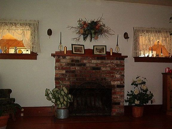 living room with working fireplace