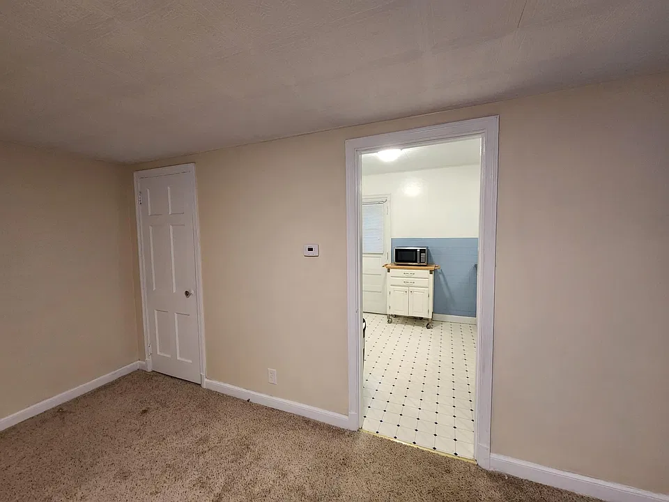 Kitchen that leads off of the living room.