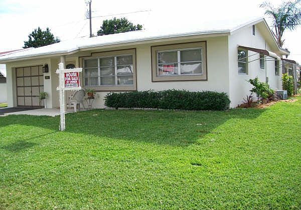 Spacious Corner Home with Garage!