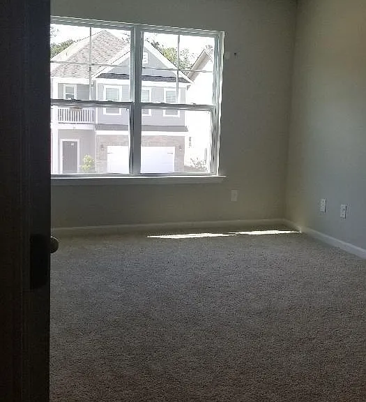 Large Master Bedroom with tray ceiling.