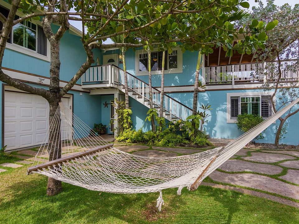 This is an outside view of the home. The rental is upstairs.