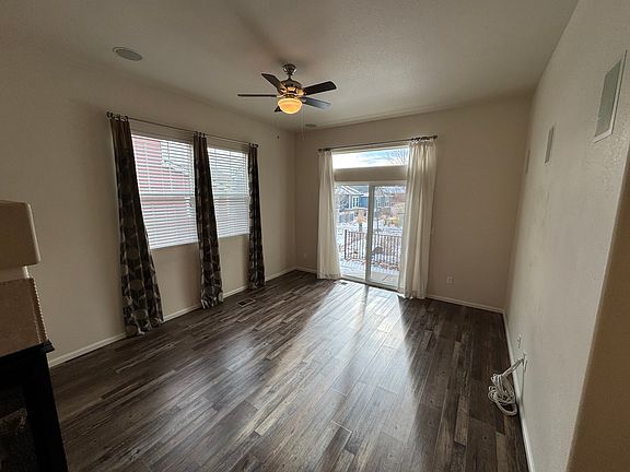 Living room space with prewired speakers for surround sound entertainment options.
