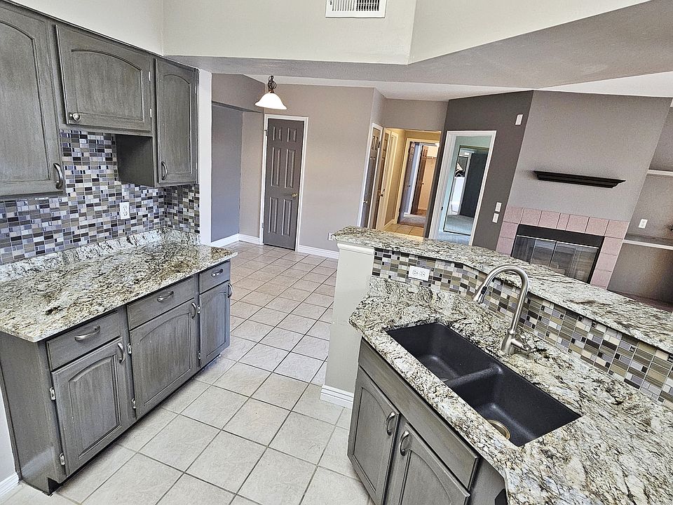 Custom Granite Kitchen, Glass Tile Backsplash, Stainless Steel Appliances, Black Composite Granite Dual Bowl Sink