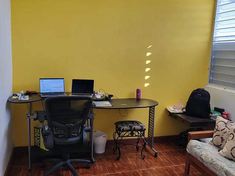 3rd Bedroom with computer desk, chair, full size futon and closet.