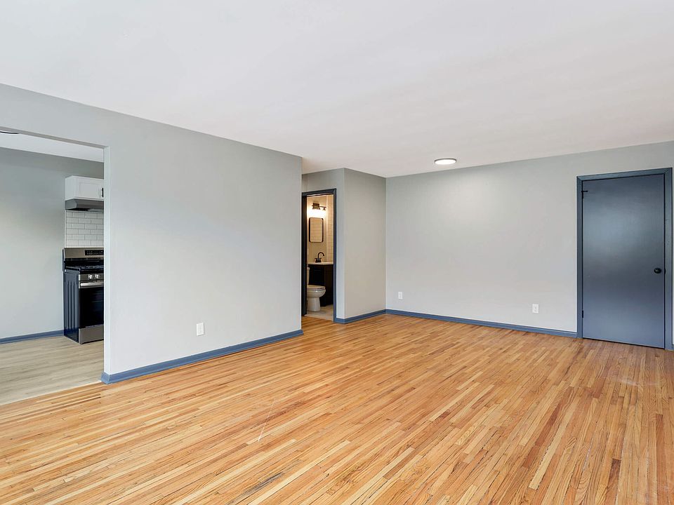 The available unit has carpet instead of hardwood floors.