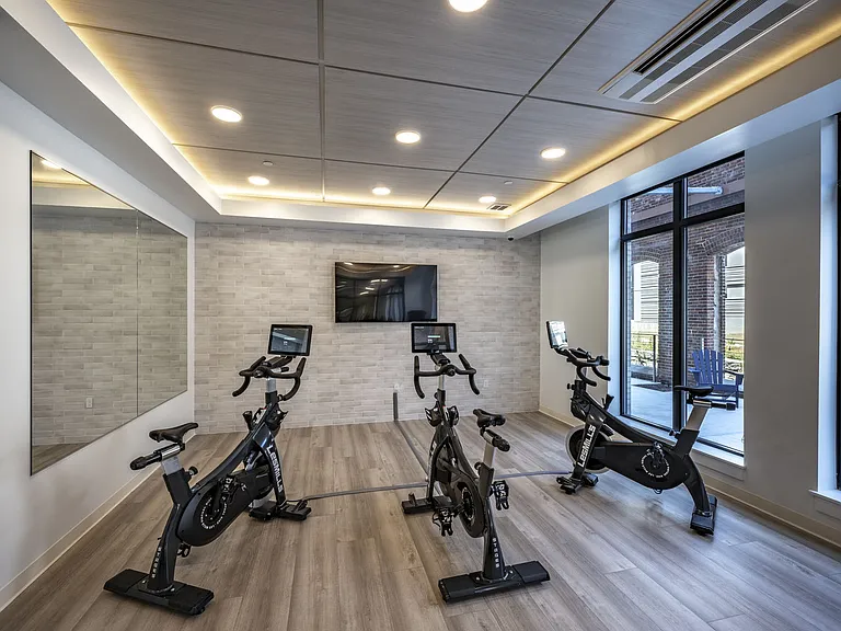 Cycling Room With Bikes, Tv And Mirror.