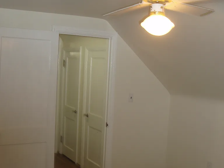 2nd floor back bedroom, closet in right outside the door in hall.
