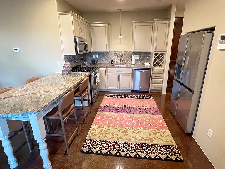 Lower Kitchen and Dining Area off Media Room