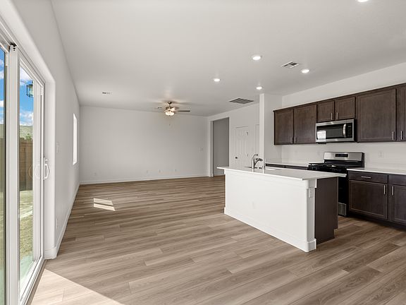 The kitchen seamlessly flows into the dining and living area.