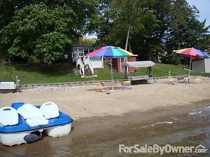 gorgeous sandy beach : conveniently beach your boat or PWC...perfect swimming beach