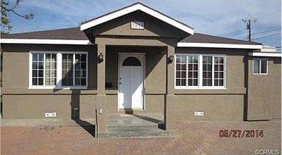 Long driveway to the 2-car garage