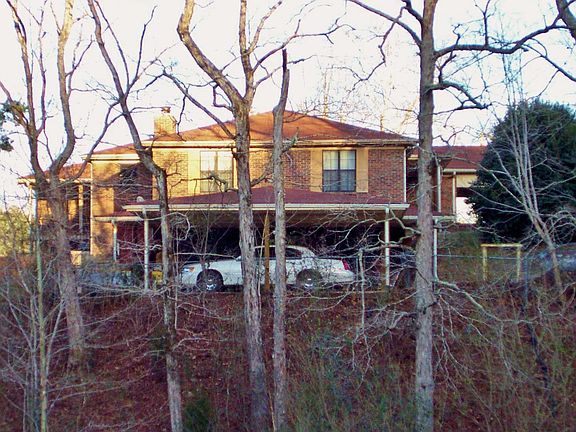 Side view w/ carport
