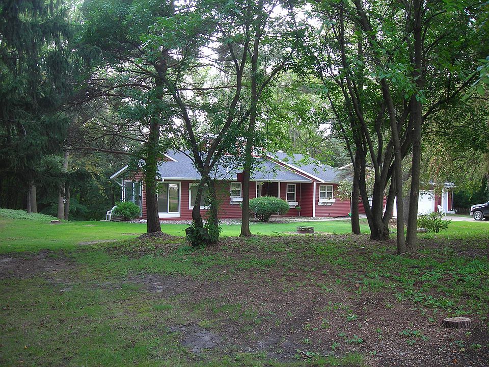 Front of house with trees