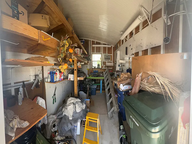 The attached shed is huge for storage and has a 10,000 watt Generator that attaches to the home in case of a power outage.