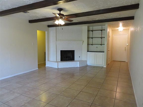Den or Living Room with Updated Tile Floors