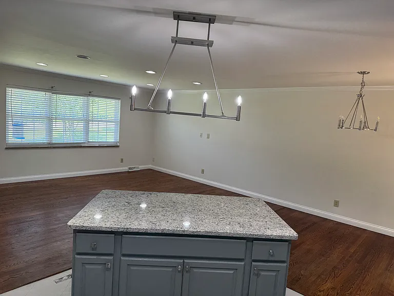 Kitchen centre Island opens to living room