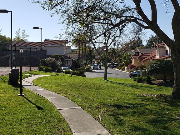 View of cul-de-sac the house is on, and the park/tennis court