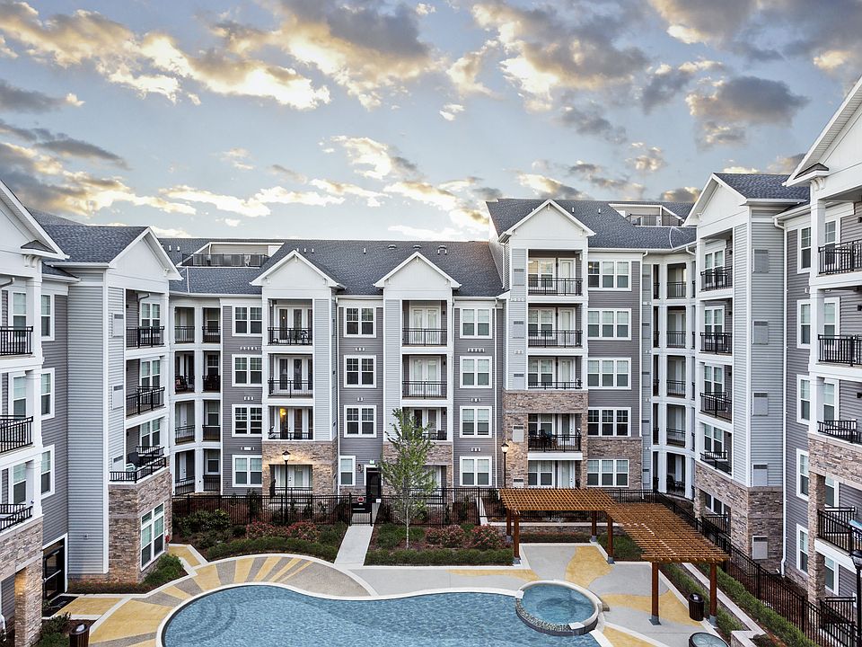 Resort-Style Swimming Pool With Expansive Tanning Areas