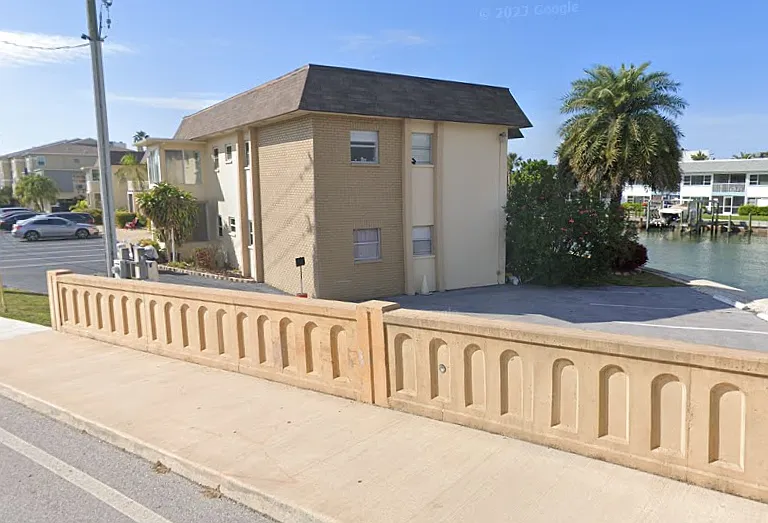 View of building from Isle of Capri bridge.