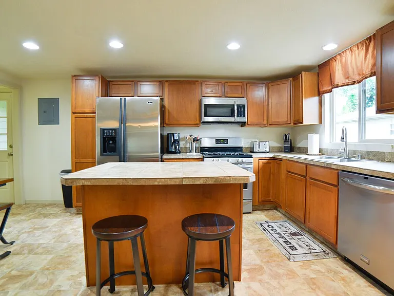 Fully stocked kitchen with gas range