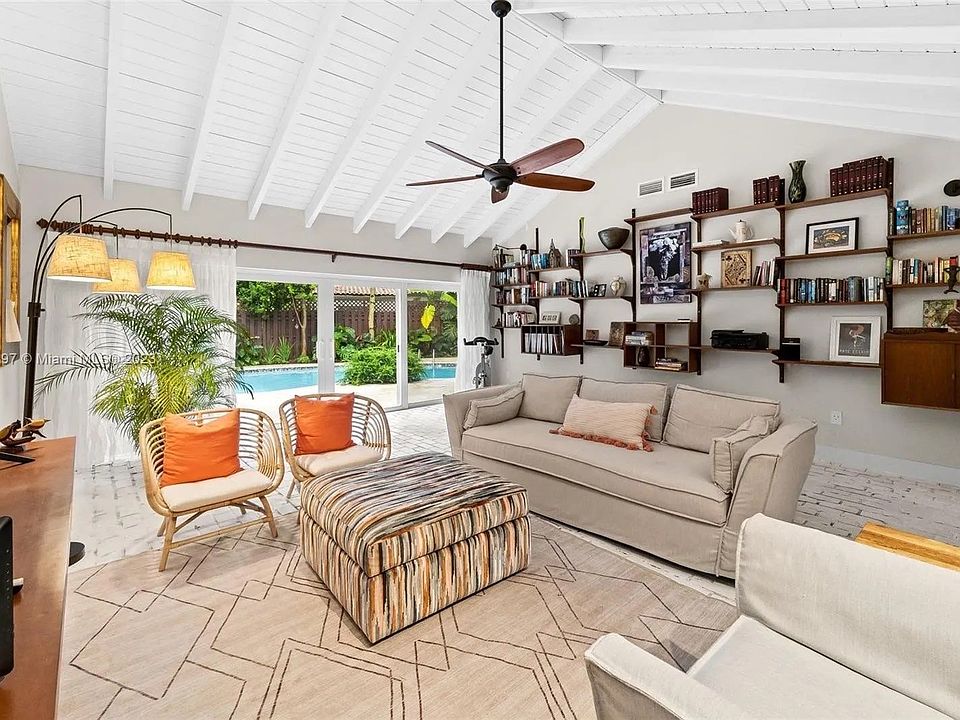 Vaulted ceiling media room.
