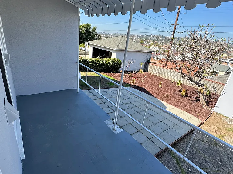 Freshly Painted Porch to enjoy the days and evenings with the privacy of your own backyard