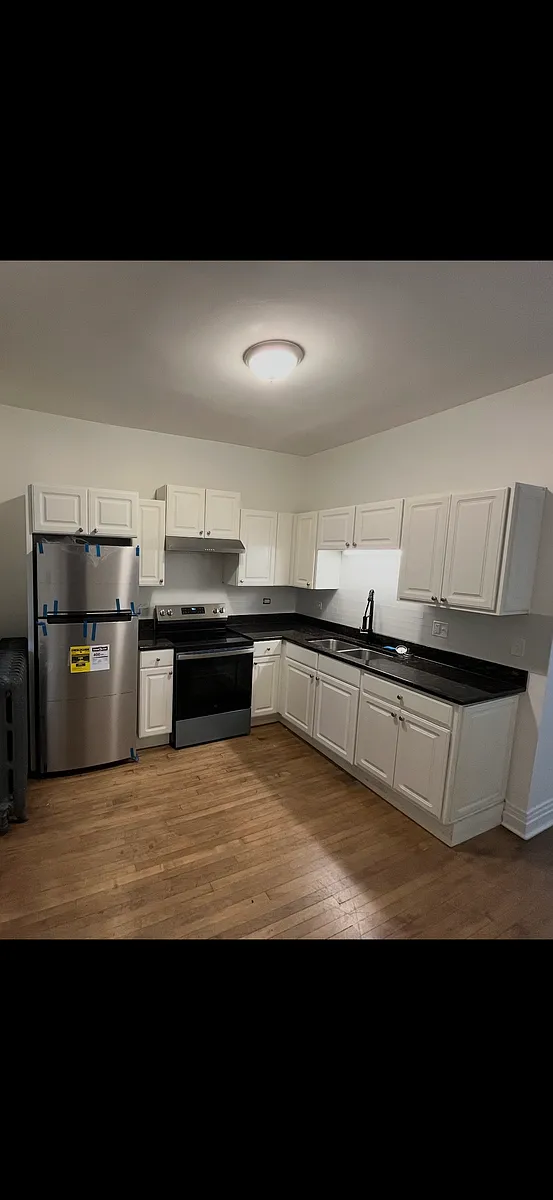 Building Photo - 7816 S Coles Ave #2