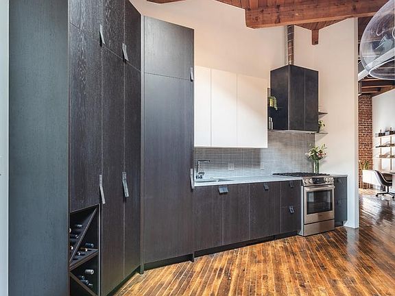 Kitchen with built-in Bar + Wine Bottle Storage
