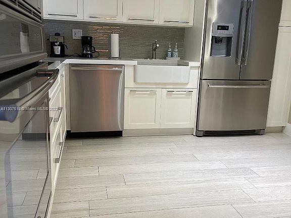 5th image of 3500 Mystic Pointe Dr APT 1507