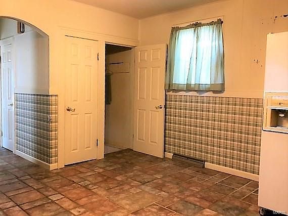 Large kitchen with access to lower level.