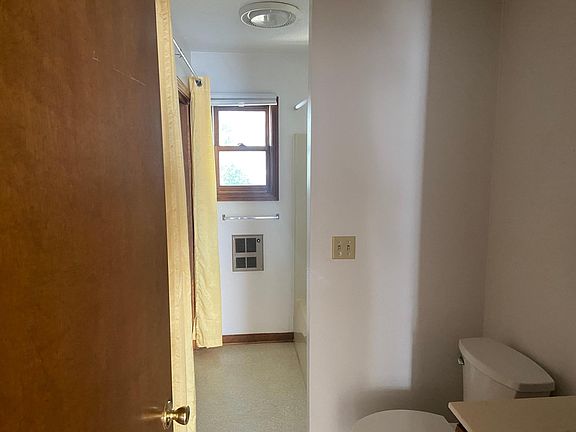 bathroom with Maytag washer /dryer