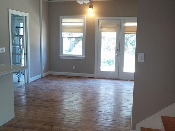 Dining room with reclaimed pine flooring
