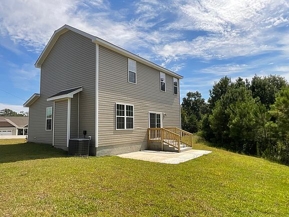 Back Yard with Concrete Patio