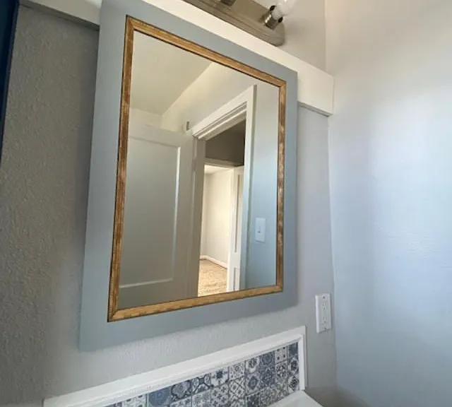 New Mirror Details and Decorative Backsplash