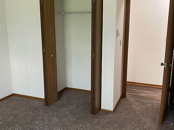 Smaller bedroom closet.