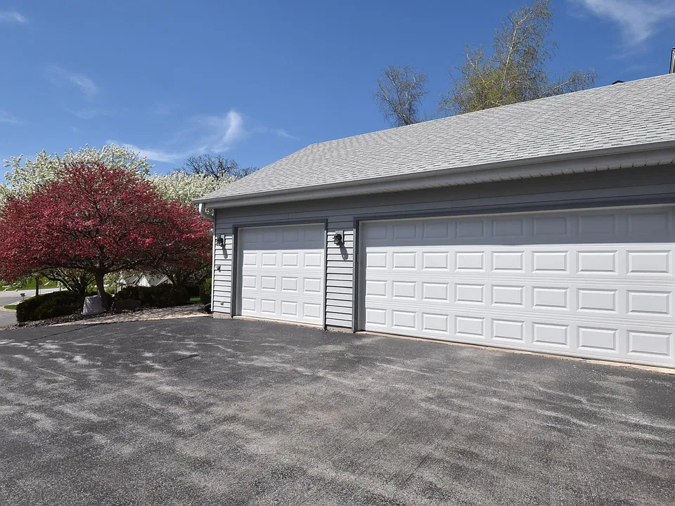 extra deep 3-car garage with openers